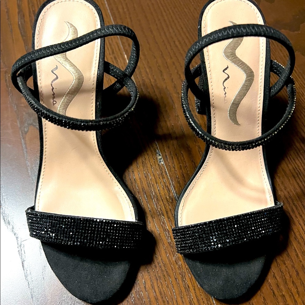 Black night block heels, size 7. Worn once. Too high for me, can't wear again.